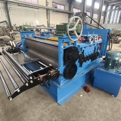 Máy dập nổi tấm thép